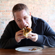Illustration for article titled We’re Sorry To Inform You That This White Supremacist Struggling To Eat A Giant Burrito Is All Of Us